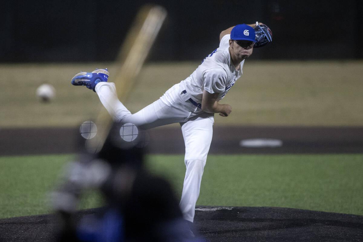 Bishop Gorman pitcher Kamdyn Perry throws to Basic during a high school baseball championship g ...