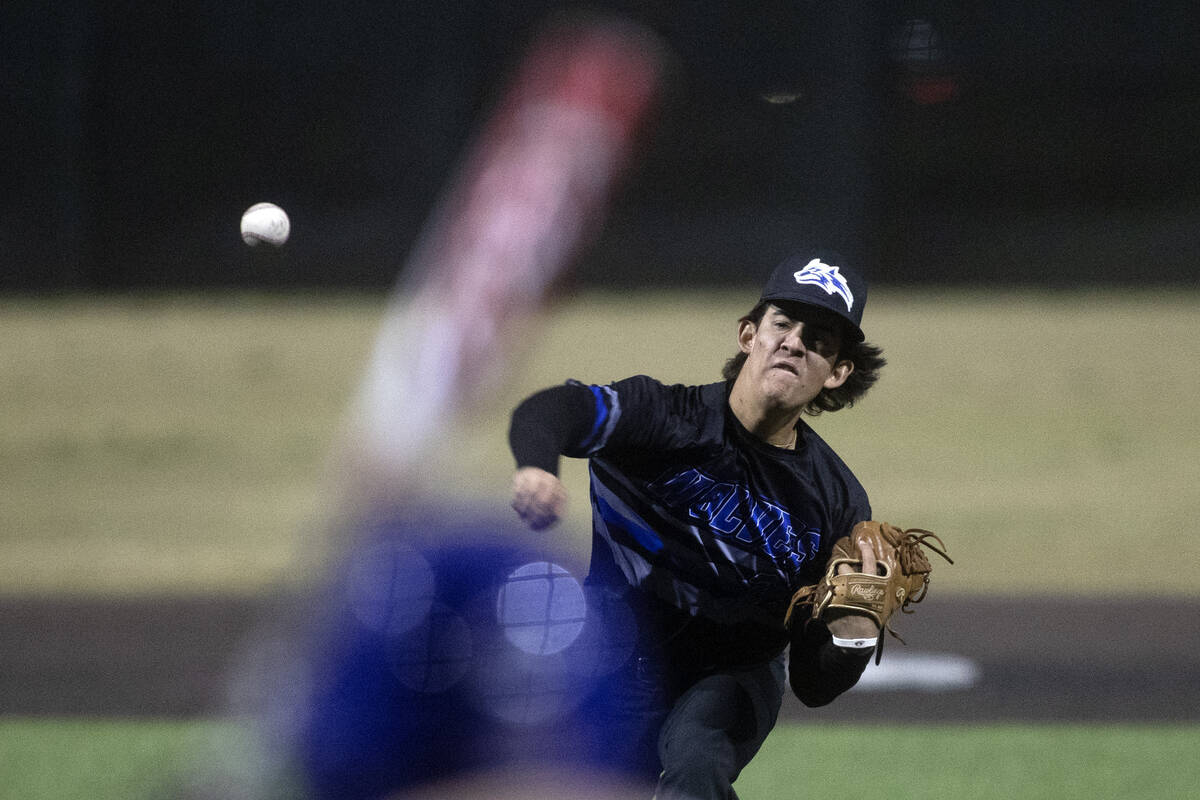 Basic pitcher Josh Higgins throws to Bishop Gorman during a high school baseball championship g ...