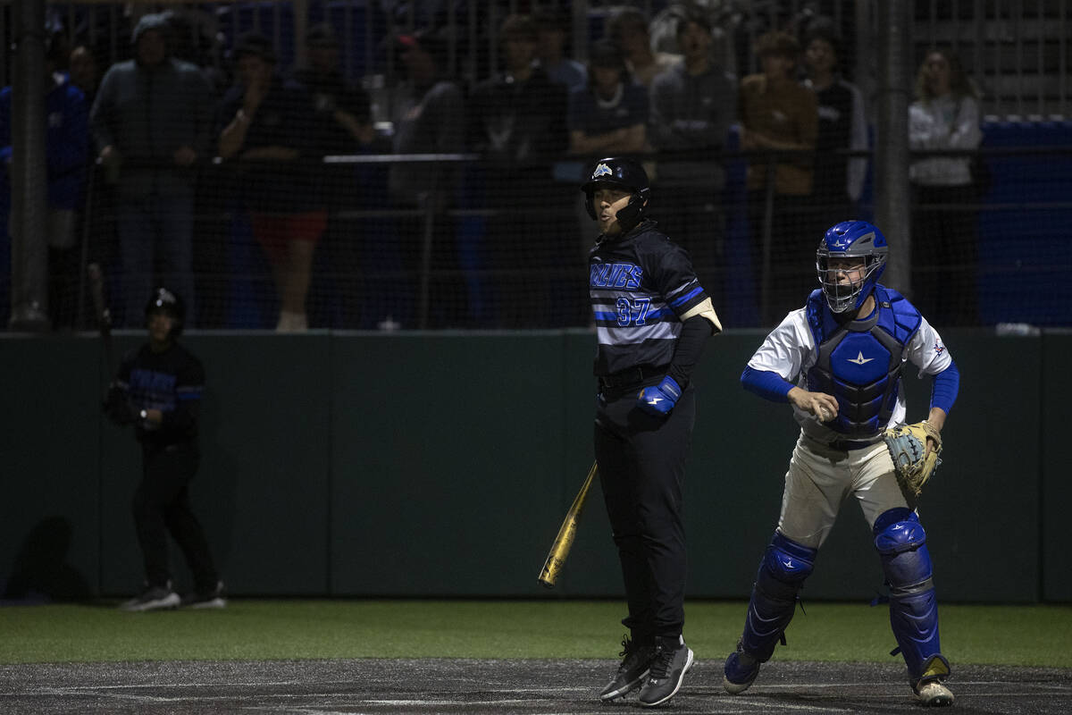 Basic’s Marcus Troyano reacts after striking out during a high school baseball champions ...