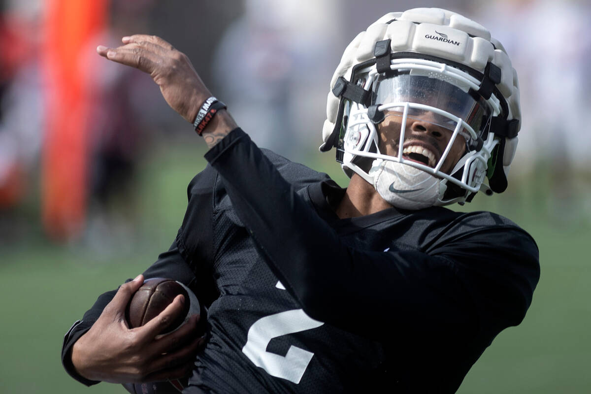 Quarterback Doug Brumfield makes a catch during UNLV football practice at Fertitta Football Com ...