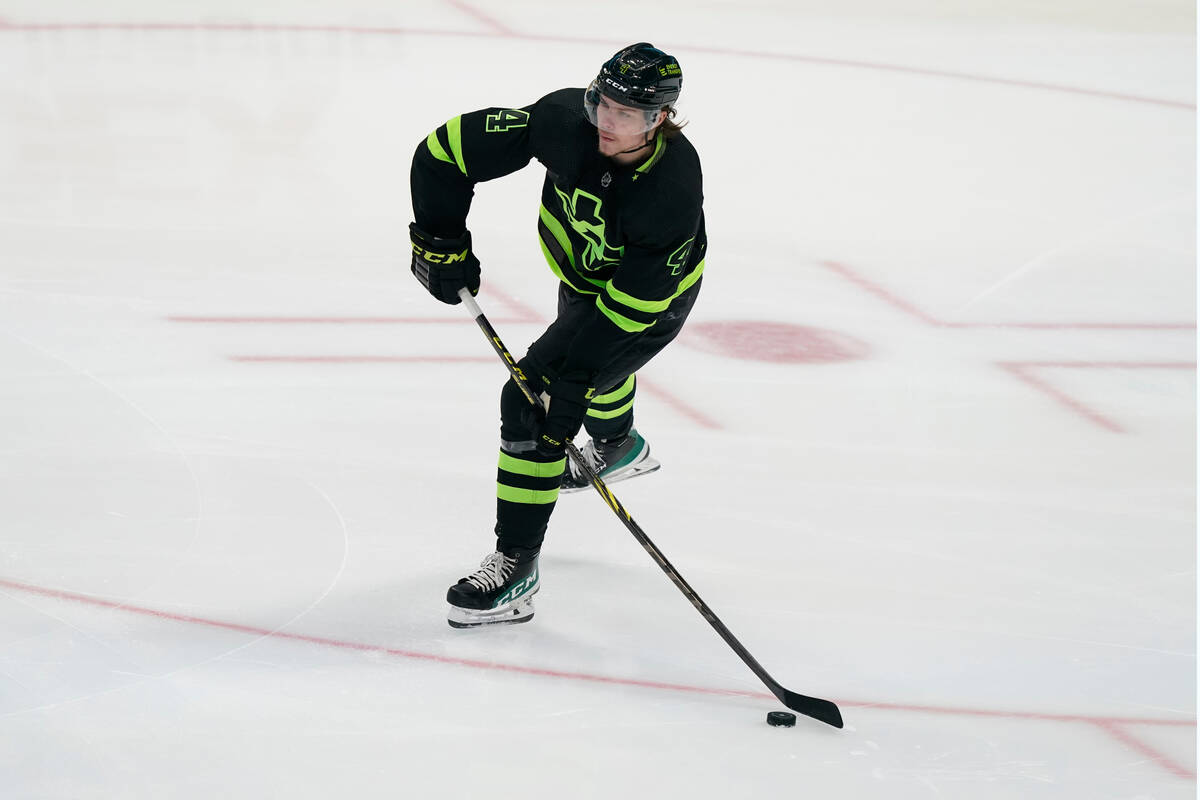 Dallas Stars defenseman Joel Hanley (44) passes the puck during the first period of an NHL hock ...