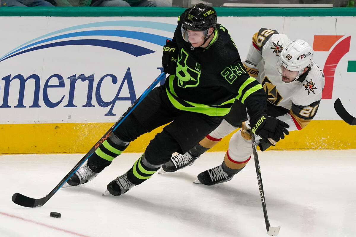 Dallas Stars defenseman Esa Lindell (23) skates with the puck against Vegas Golden Knights cent ...