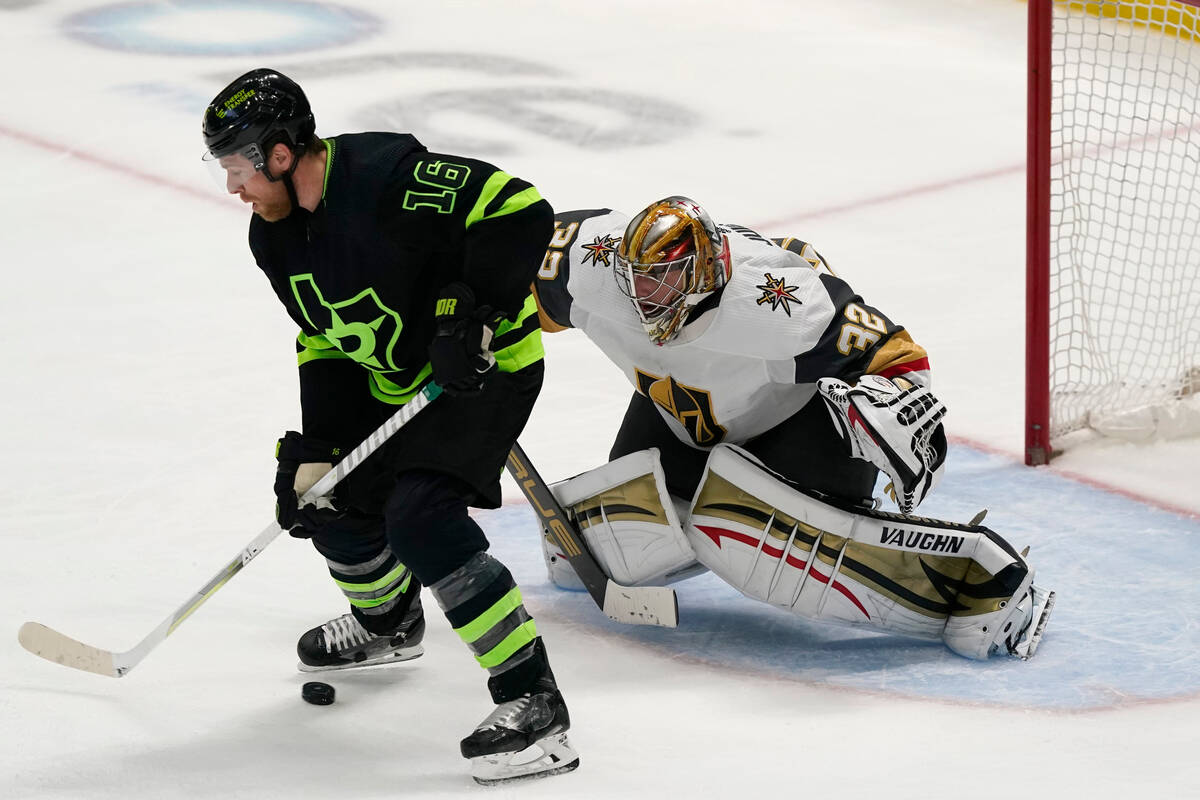 Vegas Golden Knights goaltender Jonathan Quick (32) defends the goal against Dallas Stars cente ...