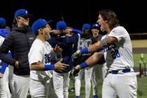 Bishop Gorman’s Landon Criste, left, and Easton Shelton celebrate after winning a high s ...