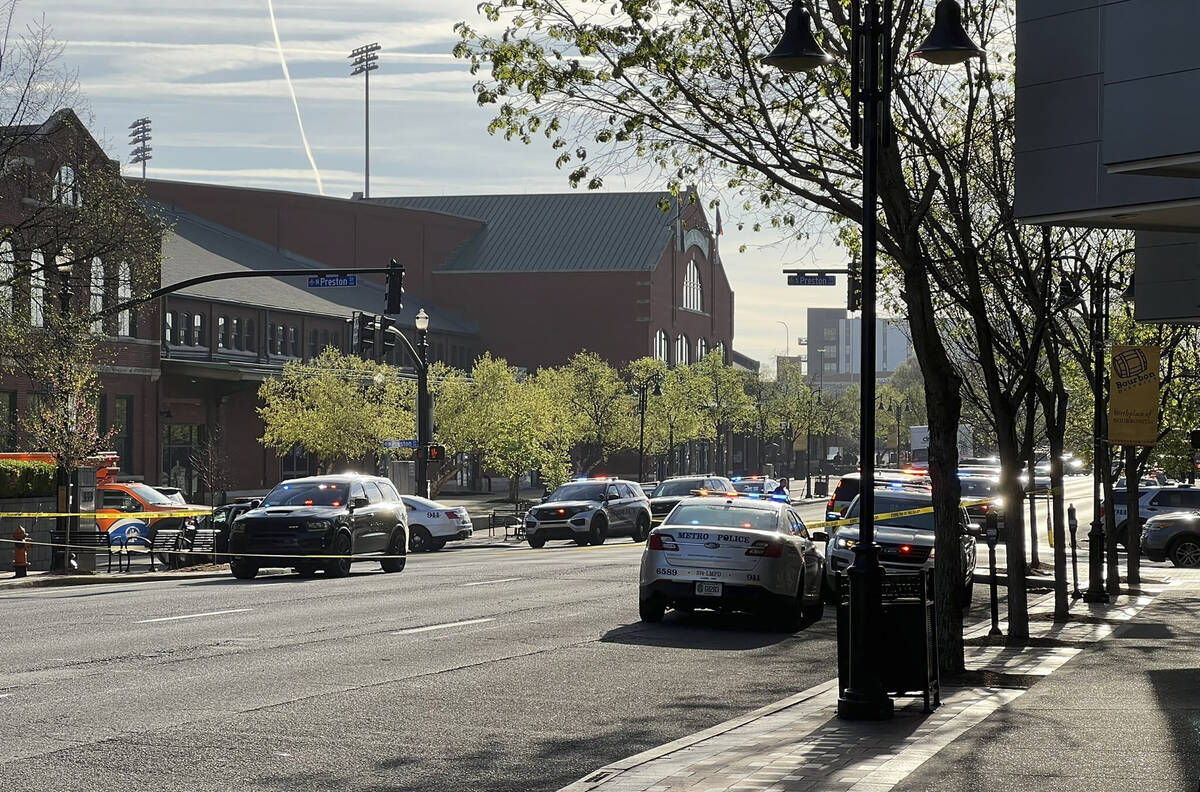 This photo provided by Terrance A. Sullivan shows police presence near the scene of a shooting ...