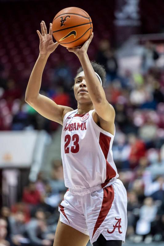 Alabama guard Brittany Davis (23) shoots a free throw during the first half of an NCAA college ...