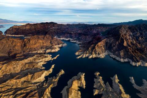 The late-day light etches out "The Narrows" above the receding Lake Mead shoreline on ...