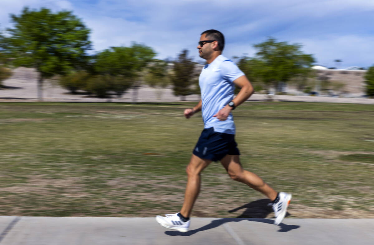 Eddie Saiz, of Henderson, trains for the Boston Marathon at Cornerstone Park on Wednesday, Apri ...