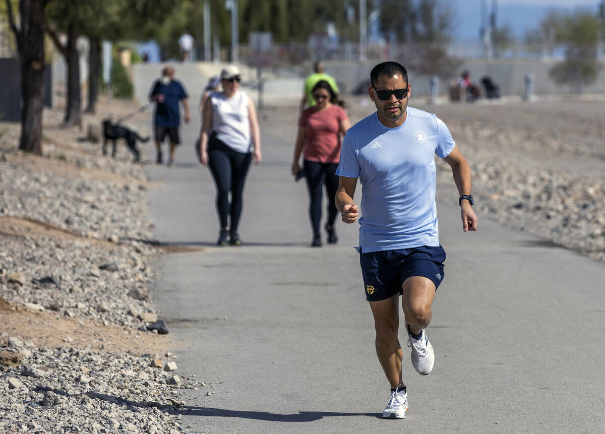 Eddie Saiz, of Henderson, trains for the Boston Marathon at Cornerstone Park on Wednesday, Apri ...