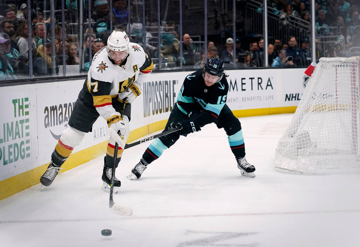 Vegas Golden Knights defenseman Alex Pietrangelo (7) plays the puck past Seattle Kraken left wi ...