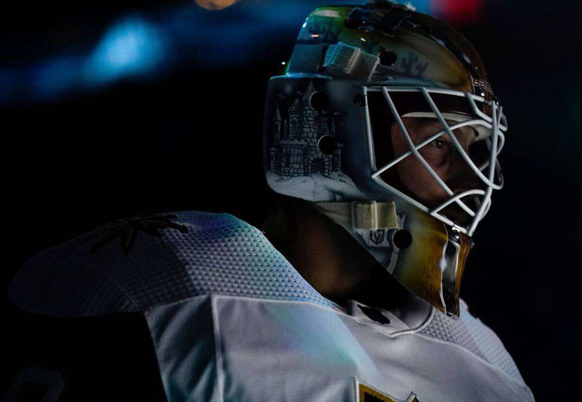 Vegas Golden Knights goaltender Laurent Brossoit stands on the ice before the the team's NHL ho ...