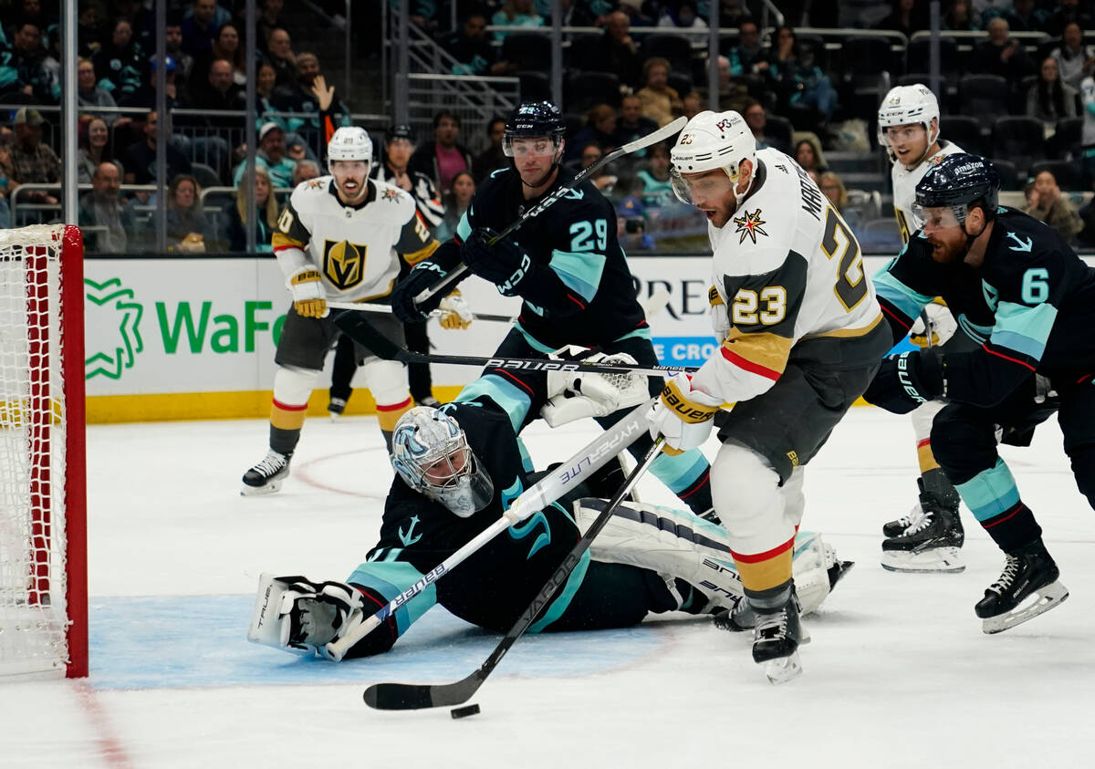 Vegas Golden Knights defenseman Alec Martinez (23) prepares to shoot against Seattle Kraken goa ...