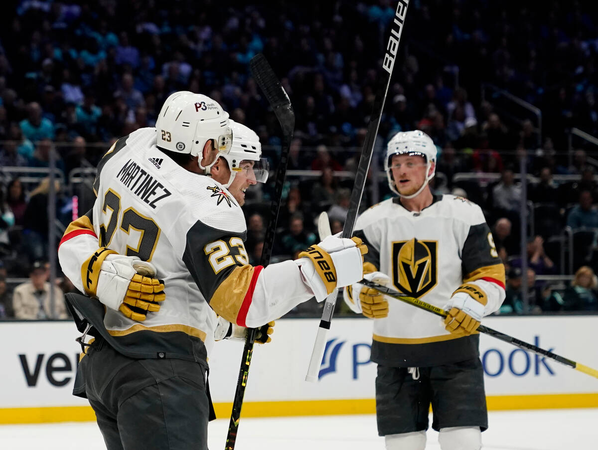 Vegas Golden Knights defenseman Alec Martinez (23) celebrates his goal against the Seattle Krak ...