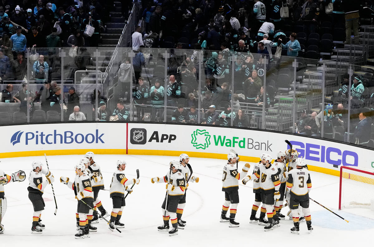 The Vegas Golden Knights celebrate a 3-1 victory over the Seattle Kraken in an NHL hockey game ...