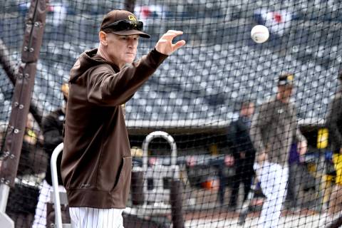 San Diego Padres coach Matt Williams catches a tossed ball during warmups before a baseball gam ...