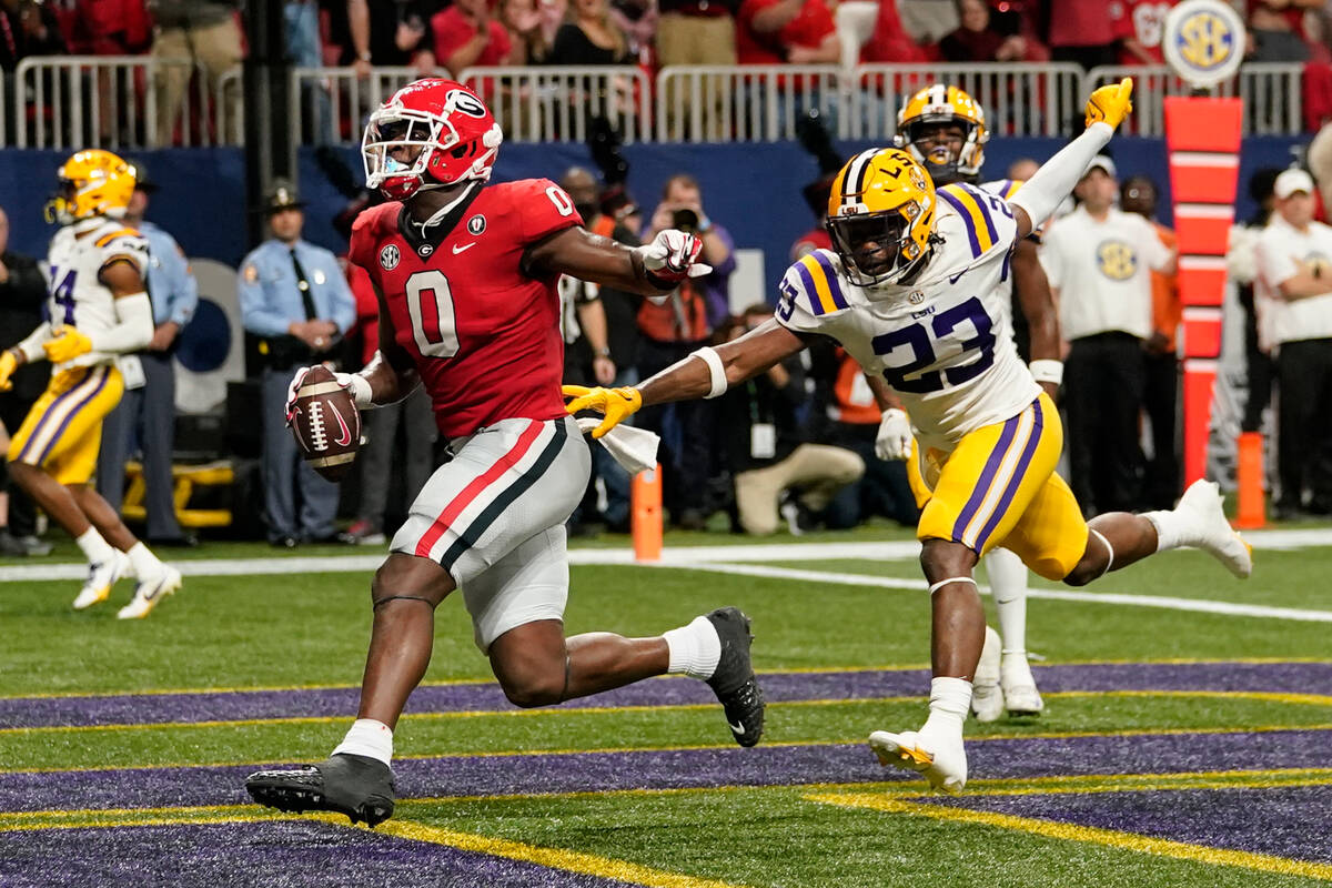 Georgia tight end Darnell Washington (0) scores a touch down in the first half of the Southeast ...