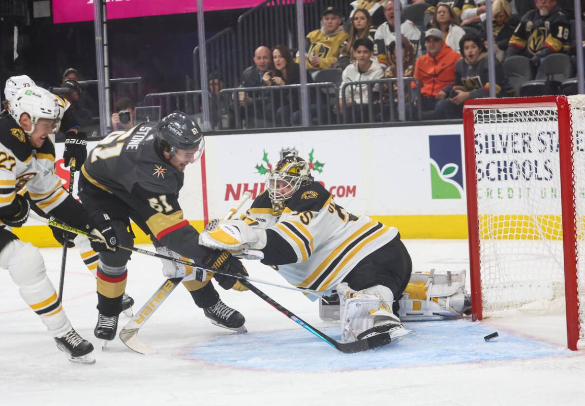 Golden Knights right wing Mark Stone (61) scores a goal past Boston Bruins goaltender Linus Ull ...