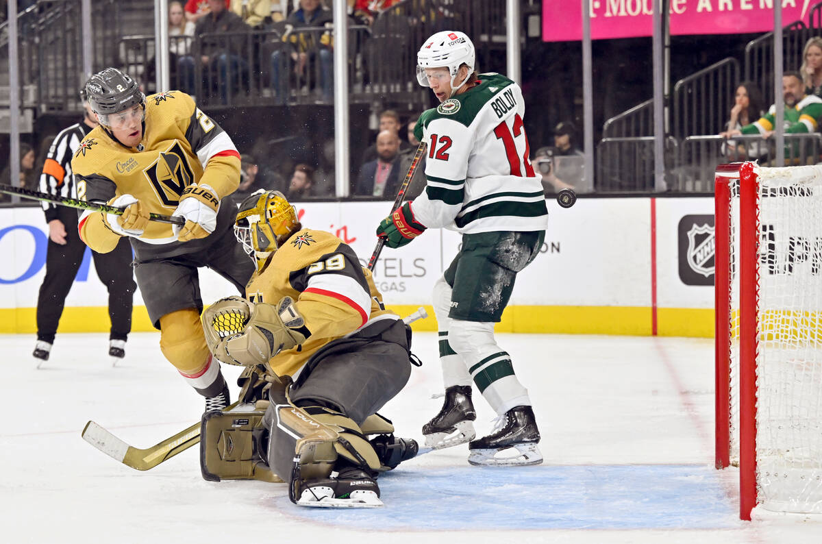 Minnesota Wild left wing Matt Boldy (12) looks on as he scores a goal against Vegas Golden Knig ...