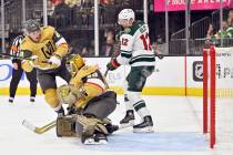 Minnesota Wild left wing Matt Boldy (12) looks on as he scores a goal against Vegas Golden Knig ...