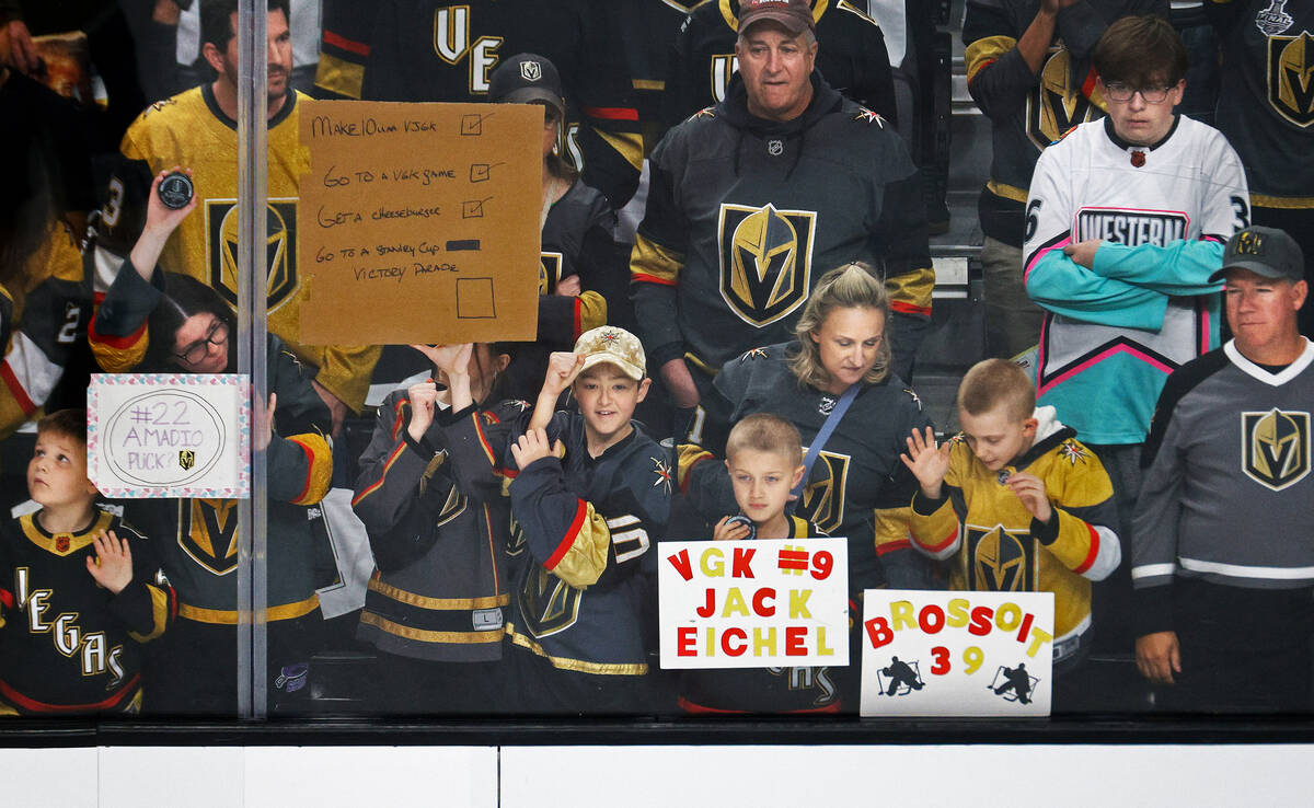 Golden Knights fans cheer during the warm up session of Game 1 of an NHL hockey Stanley Cup fir ...