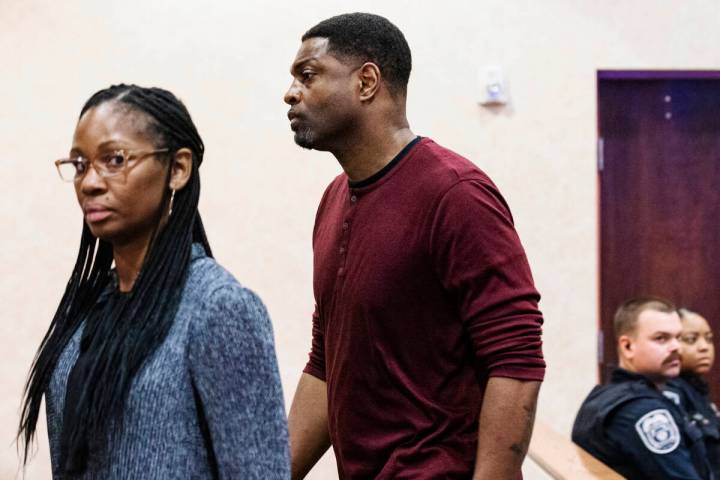 Bobby Smith, a pastor at New Beginnings Ministries, and his wife, LaShawn, leave the courtroom ...