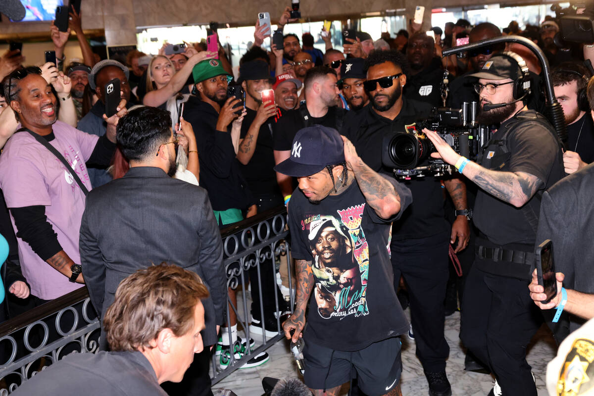 Fans cheer as Gervonta Davis makes his way to the stage during the grand arrivals event at MGM ...