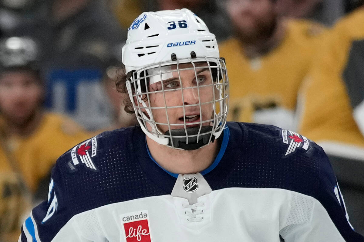 Winnipeg Jets center Morgan Barron (36) plays with a bandage against the Vegas Golden Knights d ...