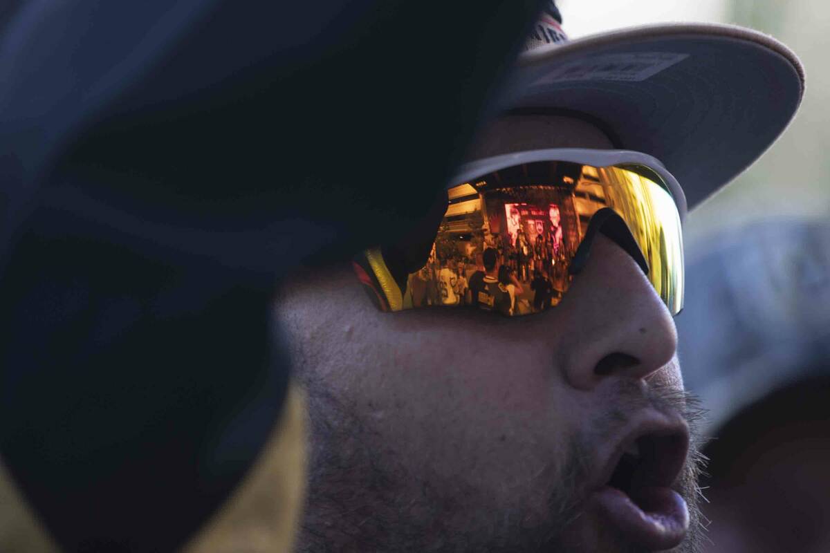 Golden Knights fan David Ibarra, of Las Vegas, cheers during the outdoor pregame show before Ga ...