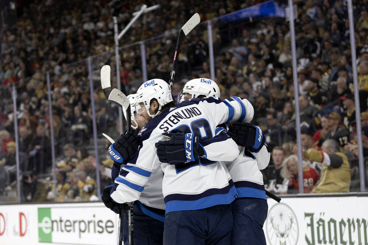 The Winnipeg Jets including center Kevin Stenlund (28) celebrate after scoring during the secon ...