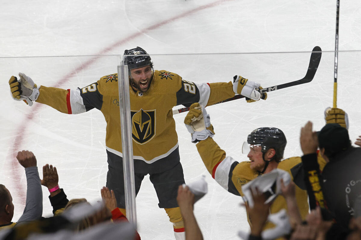 Golden Knights center Jack Eichel (9), right, celebrates with Golden Knights right wing Michae ...