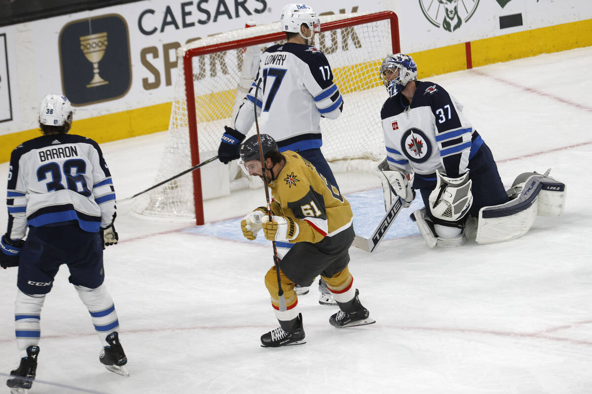 Golden Knights right wing Mark Stone (61) reacts after scoring against Winnipeg Jets goaltender ...