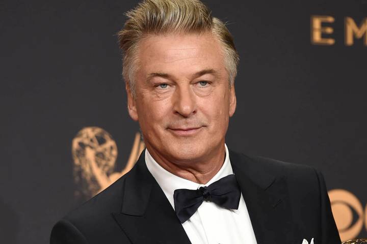 FILE - Alec Baldwin poses in the press room with the award for outstanding supporting actor in ...