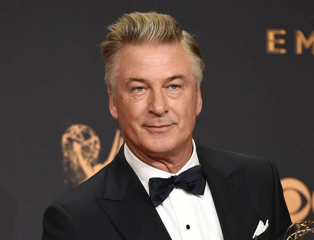 FILE - Alec Baldwin poses in the press room with the award for outstanding supporting actor in ...