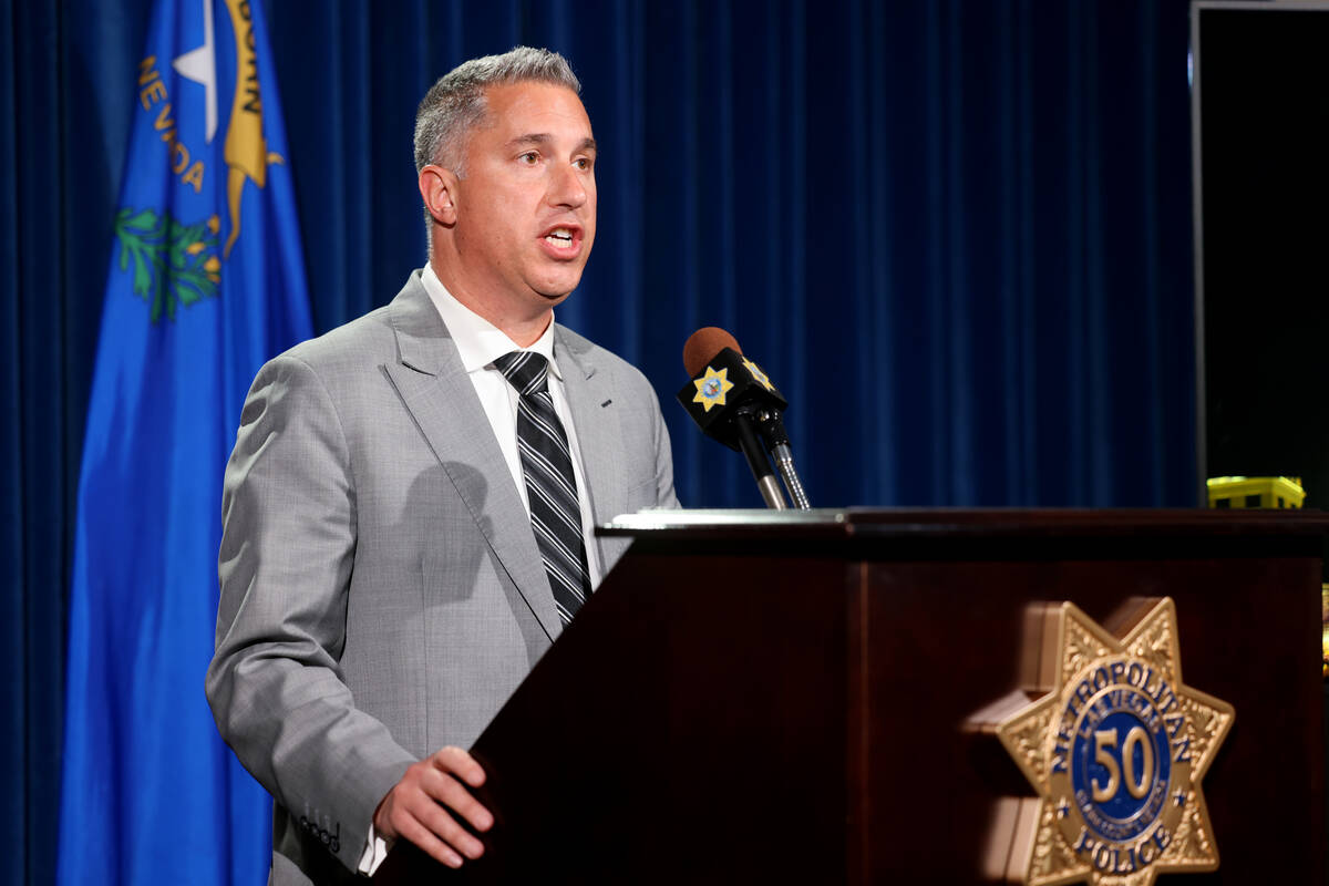 Deputy Chief Nicholas Farese updates the news media at Metropolitan Police Department headquart ...