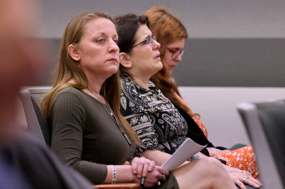 Jennifer Saltzman, wife of Rodney Saltzman, left, reacts during sentencing for Keshaughn Robins ...