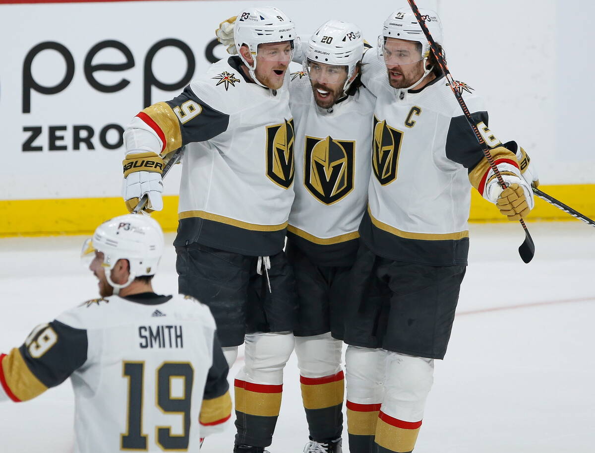 Vegas Golden Knights' Reilly Smith (19), Jack Eichel (9), Chandler Stephenson (20) and Mark Sto ...