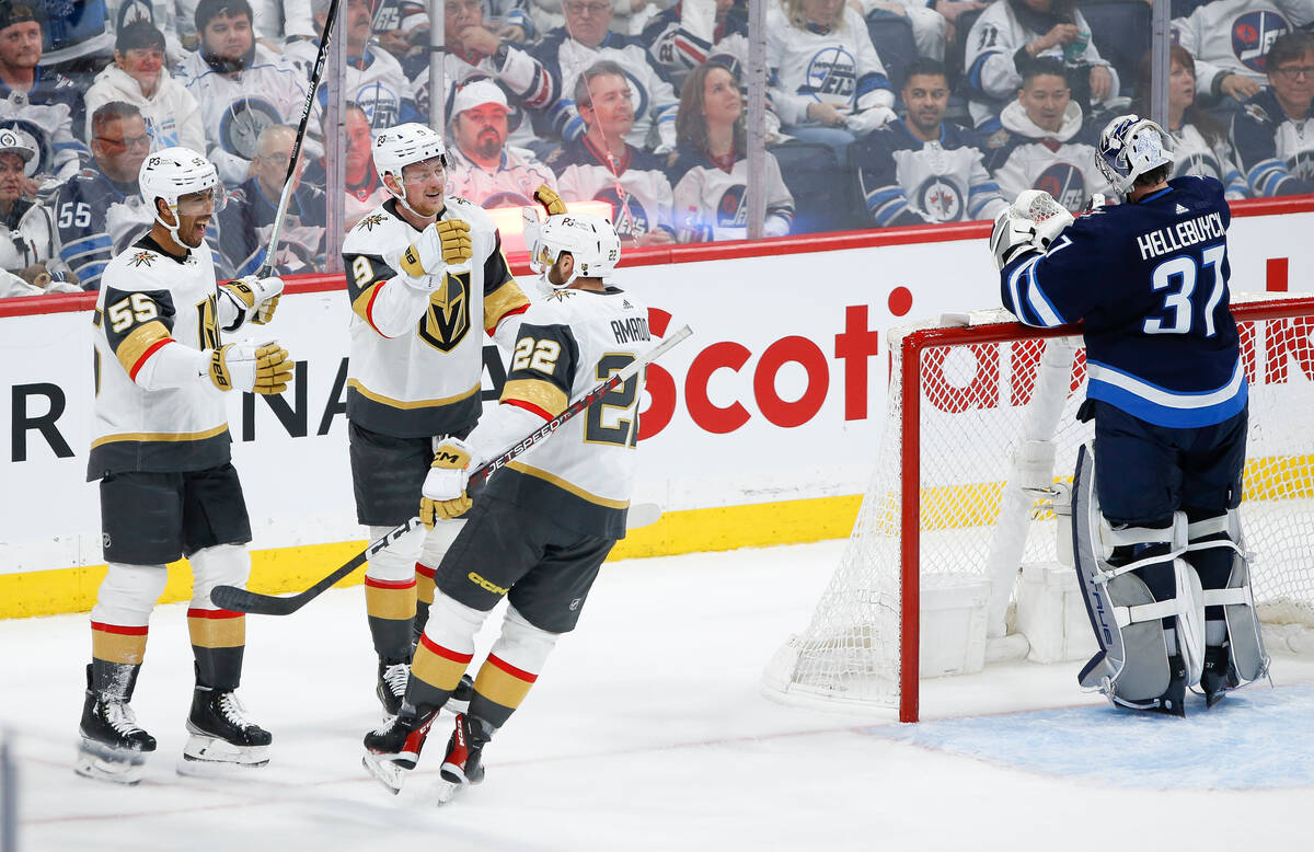 Vegas Golden Knights' Keegan Kolesar (55), Jack Eichel (9) and Michael Amadio (22) celebrate Ko ...