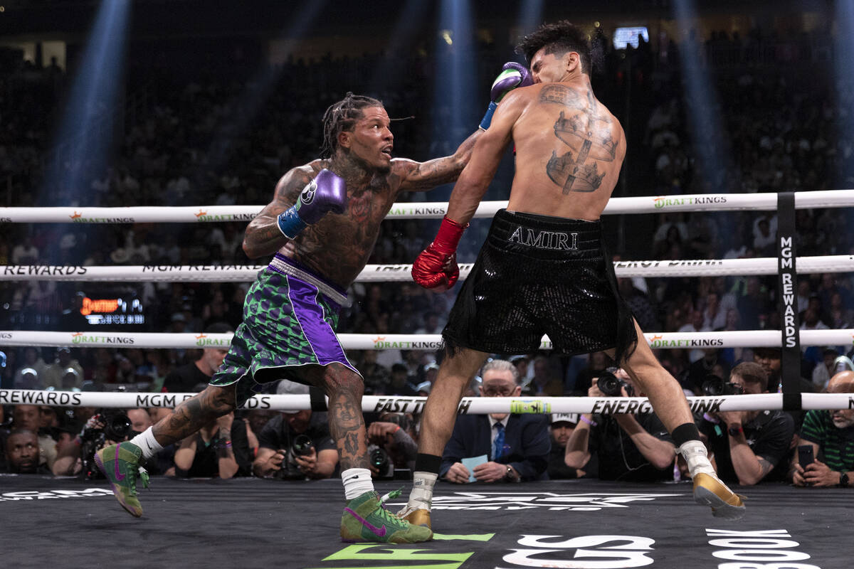 Gervonta Davis punches Ryan Garcia during a catchweight boxing bout at T-Mobile Arena on Saturd ...