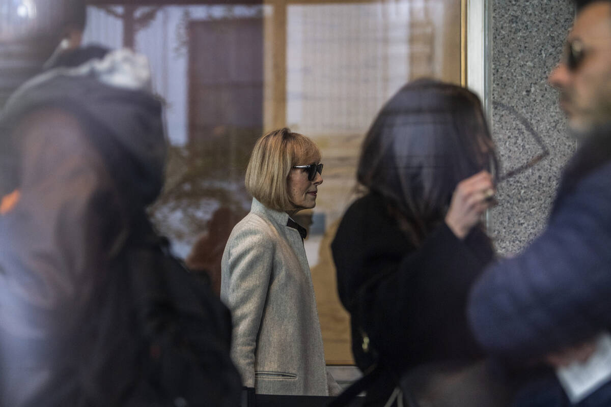 Former advice columnist E. Jean Carroll walks into Manhattan federal court on Tuesday, April 25 ...