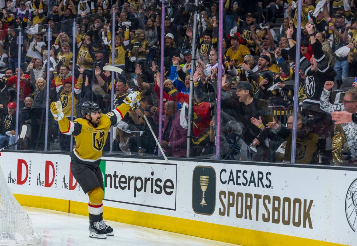 Golden Knights center Chandler Stephenson (20) celebrates scoring the first goal over Winnipeg ...