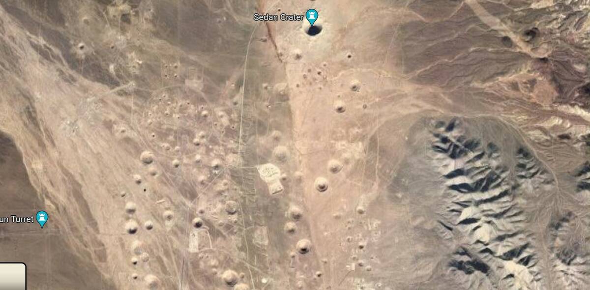 Screenshot of Google Earth that shows craters from nuclear tests on the Nevada National Securit ...