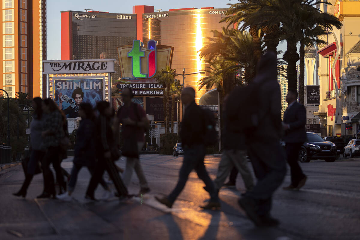 Visitors to the Strip cross Las Vegas Boulevard in November 2022 in Las Vegas. (Ellen Schmidt/L ...