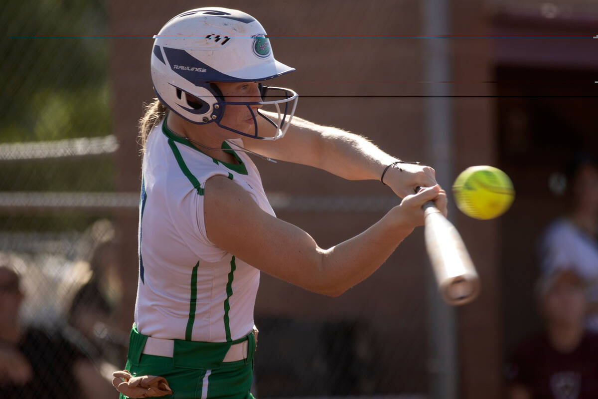 Green Valley first baseman Aspyn Beattie bats against Faith Lutheran during a high school softb ...