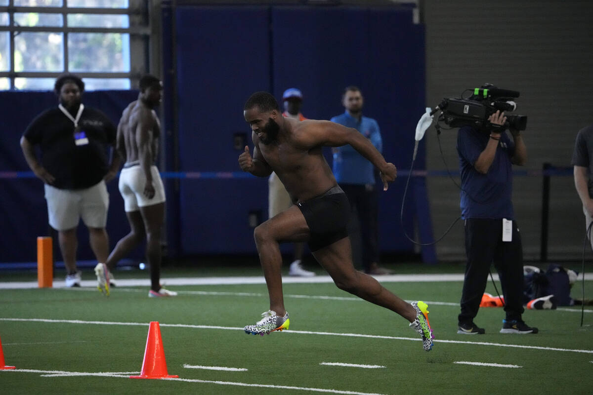 Florida linebacker Amari Burney runs a 40-yard dash during an NFL football Pro Day, Thursday, M ...