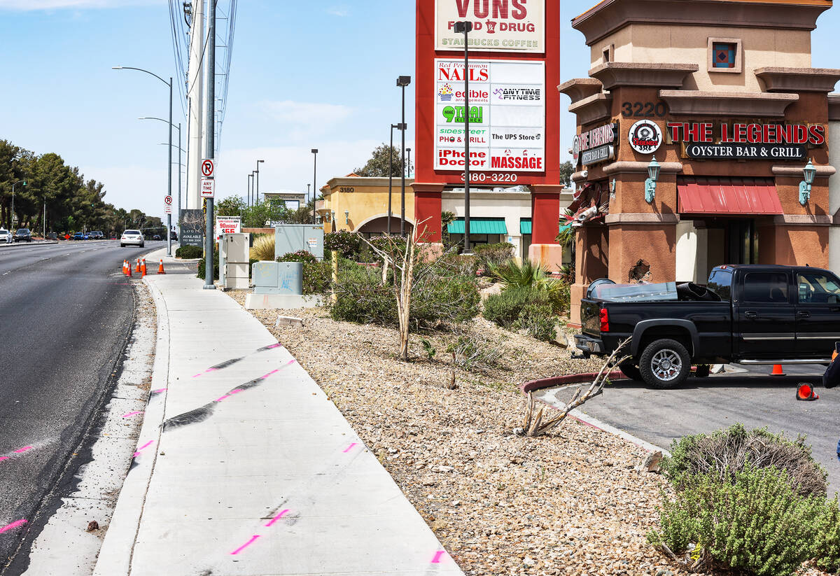 The scene of a fatal car crash outside The Legends Oyster Bar & Grill in Las Vegas, Sunday, ...