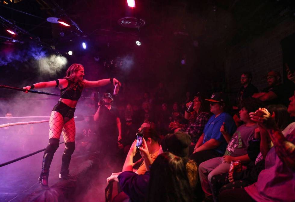 Bryn Thorne tosses a drink into the crowd at the Hope to Die show organized by PrideStyle Pro W ...