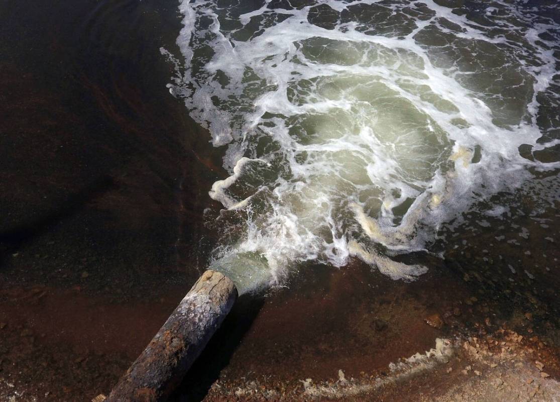 Water is pumped into an evaporation pond at Albemarle's lithium mine in Silver Peak, Nev., on T ...