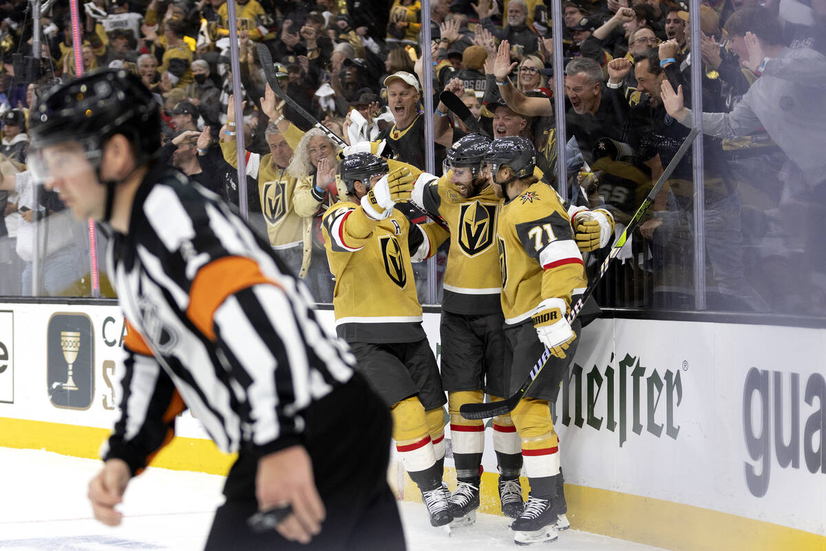 Golden Knights right wing Reilly Smith, left, right wing Michael Amadio, center, and center Wil ...