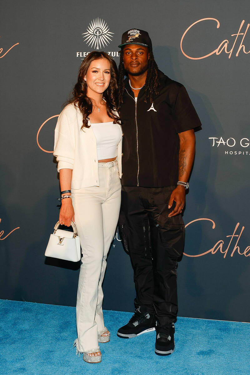 Raiders receiver Davante and Devanne Adams are shown at the grand opening of Cathédrale Restau ...