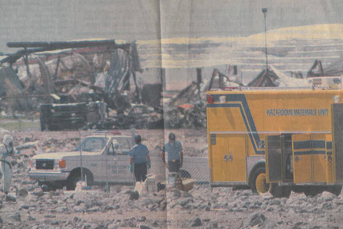 Clark County firefighters clean up hazardous materials scattered during the explosions in Hende ...